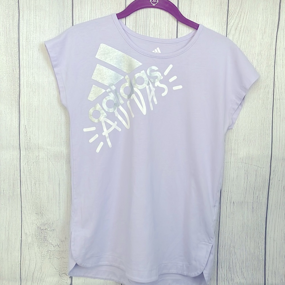 Adidas girls shirt size XL 16 light purple in color.